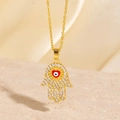 Collier main de Hamsa dorée avec cœur rouge et œil maléfique incrusté de zircon - Style Doré Main de Fatma Œil Bleu Cœur Rouge (BXL0342-68)