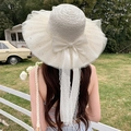 Creamy white straw sun hat featuring elegant lace, pearls, and a large ribbon bow - Large Net With Butterfly Milky White