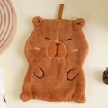 Close-up of soft brown capybara hanging towel made of thick coral fleece fabric - Touching Belly Style