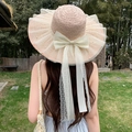 Pink straw sun hat featuring wide mesh brim with pearls and a large lace bow - Large Net With Butterfly Pink