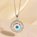 Collier mauvais œil en argent avec centre bleu et pavé de zircons blancs éclatants - Style Argenté Œil Bleu Pavé de Zircone (BXL0342-95)