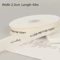 Creamy white 2cm polyester ribbed ribbon with black U LOOK PRETTIER TODAY print - English U LOOK (Grosgrain Ribbon)