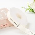 Ribbed cream satin ribbon with Love Story text and tulip pattern for gift wrapping - Love Story