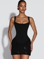 Abito nero attillato con corpetto a corsetto e gonna di paillettes luccicanti da sera - S / Nero