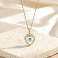 Collier coeur doré avec pendentif oeil bleu et zircons sur socle en pierre - Style Cœur Œil Bleu Pavé de Zircone (BXL0342-147)