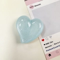 Light blue glitter heart phone socket grip with glossy finish on a decorative card - Pearlescent Sky Blue