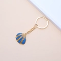 Golden keychain with blue shell enamel pendant and textured marine sea snail detail - 34# (Black Gold Striped Scallop)