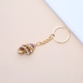 Natural brown seashell keychain with polished golden ring and spotted shell texture - 47# (Brown Spotted Conch)