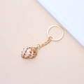 Handmade golden keychain with a natural spotted seashell pendant for bags and car keys - 46# (Spotted Spiral Shell)