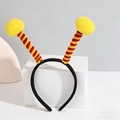 Close-up of insect antenna headband with yellow fuzzy pom poms for Christmas party - Yellow Ball & Red-Yellow Striped Antenna