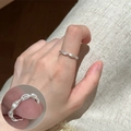 Elegant silver textured ring with zircon accents shown as a stylish finger wear - Brushed Olive Node Rhinestone Open Rings