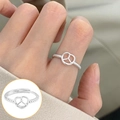 Silver twist band ring with hollow heart knot design and adjustable open fit - Open Adjustable / Braided Hollow Heart Style (JZ7511)