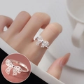 Eleganter silberner Ring mit hohler Schleife und filigranem Spitzenmuster für Damen - Hohle Spitze Filigran Schleife Ring Stil (JZ7410)