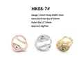 Detail view of evil eye hoop earrings with zircon pavé and blue stone in three gold finishes - Evil Eye Earring Buckle (HK08-7#)