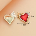 Golden heart pendant with red crystal and wings shown from front and back views - Heart / Red