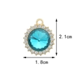 Golden alloy pendant with a large turquoise crystal and white rhinestones, size 2.1x1.8cm - Round Zircon / Lake Blue
