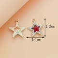 Golden star pendant with red gemstone and white crystals, measuring 2.1cm by 2.3cm - Pentagram / Red