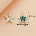 Golden alloy star charm with green gemstone and white rhinestones, size 2.1x2.3cm - Pentagram / Green
