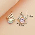 Star-shaped gold alloy pendant with pink crystal and zircon, size 2.3cm by 1.8cm - Crown / Pink