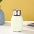 Cream mini stainless steel insulated bottle with a metal carry ring and sleek design - Off-white