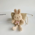 Détail du sac en paille pour enfants avec lapin en peluche et nœud en ruban rose - Beige (Lapin avec nœud rose)