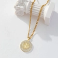 Gold-plated cross pendant necklace with zircon halo and flat chain on white pedestal - Gold/Pavé Round Medallion Cross/Curb Chain/K1
