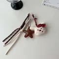 Plush rabbit head and leather star keychain with woven rope in cream and red tones - Charm / Bowknot Rabbit