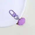 Close-up of a lavender purple cloud charm keychain with a matching metal lobster clasp - Light Purple
