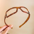Serre-tête style lunettes de soleil en écaille avec dents antidérapantes pour femmes - Ambre Texturé