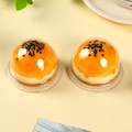 Golden yolk pastry in transparent spherical blister packaging with black sesame topping - 60-80g Round Ridged / Clear