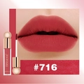 Close-up of matte red liquid lipstick #716 with gold cap and lip swatch detail - Coral Pink (#716)