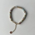 Collier fait main avec perles bleues et marbrées, séparateurs dorés et fermoir - Bracelet / Motif Serpent