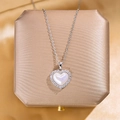 Collana cuore scintillante con madreperla bianca e alone di zirconi in argento - Catena a Croce in Argento