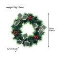 25cm Christmas wreath with green pine needles and red berries for festive decoration - Green Wreath With Red Berries And Leaves
