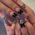 Elegant almond leopard print press-on nails featuring 3D black bows and mini rhinestones - Nude Leopard French Bow Style (XA-103-59)