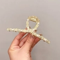 Gold metal hair claw clip with elegant white pearls in a twisted geometric design - Matte Pearl Cross