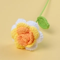 Handmade crochet rose with orange and yellow gradient petals on a soft yellow background - Reverse Curl - Creamy Rose Stem - Gradient Yellow
