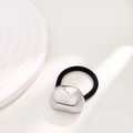 Minimalist elastic hair tie with a large irregular polished silver metal accent - Silver Small Oval Hair Tie