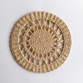 Bohemian style round straw wall decor handcrafted from natural woven corn husk fiber - Natural Hollow Radial Style (25cm)