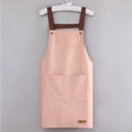 Pink waterproof kitchen apron with brown H-shaped straps and dual storage pockets - Simple Pink (Standard Style)