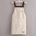 Waterproof cream apron with brown H-back straps and a rainbow patch detail - Rainbow White (Standard Style)