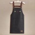 Waterproof black kitchen apron with brown PU leather straps and Hello print detail - Hello Black (Standard Style)