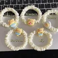 Five-piece set of cream satin scrunchies featuring cute resin cartoon bear charms - Creamy Color 6-Piece Set