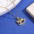 Golden rocking horse pendant necklace with sparkling cubic zirconia on a blue background - Gold Pony