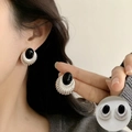 Vintage silver stud earrings with oval black stone and decorative radial texture - Vintage Silver Black Oval Studs (ED2597)