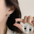 Vintage silver earrings featuring a round black stone and intricate feather engravings - Vintage Black Gem Textured Hoops (ED2580)