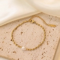 Elegant gold bead bracelet featuring a white baroque pearl and adjustable lobster clasp - E63 Pearl Bead Chain Bracelet Gold