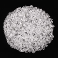 Natural clear white crystal gravel stones in round shape over a black background - High Quality Semi-Transparent / 9-12mm/100g