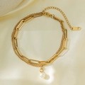 Golden double-layer bracelet with paperclip chain, delicate links and a pearl pendant - E2005 Three-Layer Chain Pearl Bracelet Gold