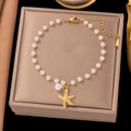Elegant gold-plated stainless steel bracelet with white pearls and a starfish charm - E225 Pearl Starfish Bracelet Gold